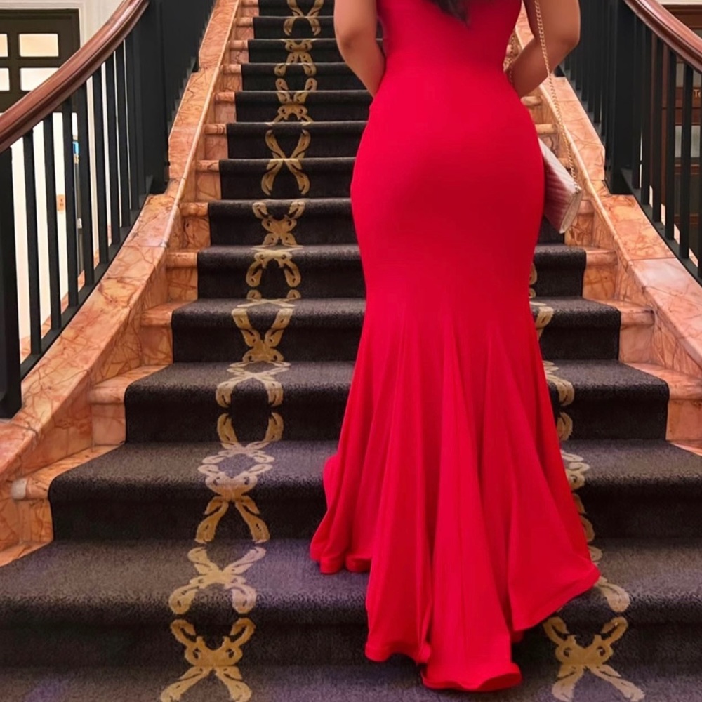Stunning La Femme Strapless Bustier Mermaid Gown